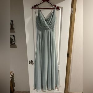 Bridesmaids dress only worn once. Very small stains on bottom